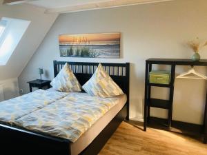 Cama o camas de una habitación en WILMA holiday home directly at the Baltic Sea