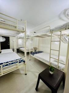 Una cama o camas en una habitación de Hostel ivory