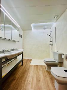 Koupelna v ubytování Sono Master Apartments + 35 fotografií