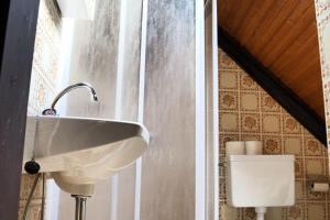 Ett badrum på Apartments Grafhube, Afritz-Verditz