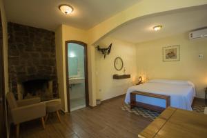 Cama ou camas em um quarto em Hotel da Cachoeira mais 37 fotos