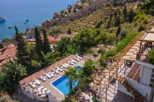 an aerial view of a resort with a swimming pool at Castle Boutique Hotel Alanya in Alanya