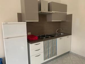 Kuchyň nebo kuchyňský kout v ubytování Casa Vacanze Mandriavecchia