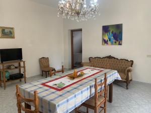 TV a/nebo společenská místnost v ubytování Casa Vacanze Mandriavecchia