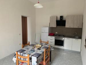 Kuchyň nebo kuchyňský kout v ubytování Casa Vacanze Mandriavecchia