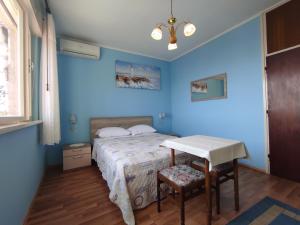 Postel nebo postele na pokoji v ubytování Apartments Rina