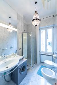 a bathroom with a sink and a shower at Gastaldaga in Cividale del Friuli