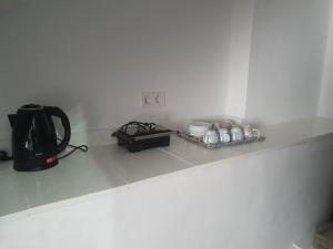 Príslušenstvo na prípravu kávy alebo čaju v ubytovaní Callisto room 4