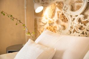 Cama ou camas em um quarto em Case Marianeddi