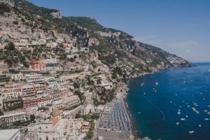 an aerial view of positano on the amalfi coast at Villa Nettuno in Positano
