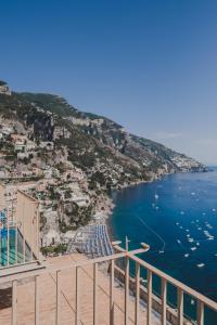 a view of the ocean and a city at Villa Nettuno in Positano