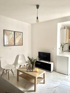 Posedenie v ubytovaní 2.1 Apartamentos Arguiñan