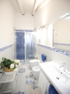 Koupelna v ubytování BLU MARE suite privata & apartment