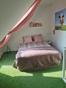 Erve Het Roolvink Boerderij Appartementen 40-50 M2 tesisinde bir odada yatak veya yataklar