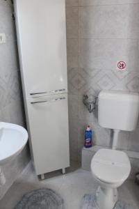 Koupelna v ubytování Rooms Zana