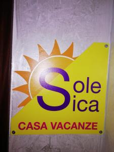 a sign on a wall with a csazona sign on it at Sole Sica in Pontecagnano