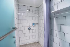Koupelna v ubytování Bobopod Pancoran, Jakarta + 24 fotografií