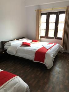 Letto o letti in una camera di Hotel Bhagya