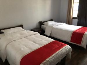 Letto o letti in una camera di Hotel Bhagya