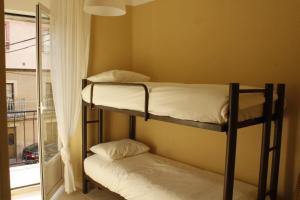 Dviaukštė lova arba lovos apgyvendinimo įstaigoje La Casa del Patio Chico