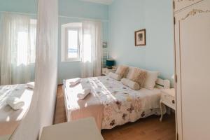 Postel nebo postele na pokoji v ubytování Arya apartment
