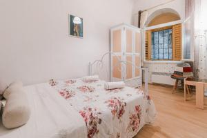 Postel nebo postele na pokoji v ubytování Arya apartment