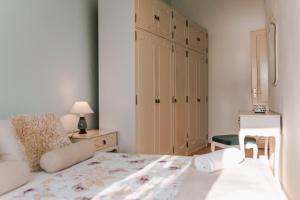 Postel nebo postele na pokoji v ubytování Arya apartment
