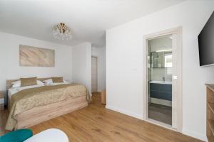Postel nebo postele na pokoji v ubytování Rooms Vedrana + 11 fotografií