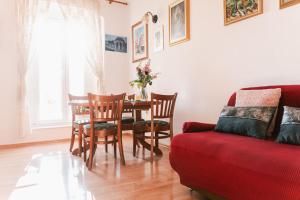 Posezení v ubytování Arya apartment