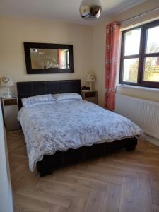 En eller flere senge i et værelse på The Denes