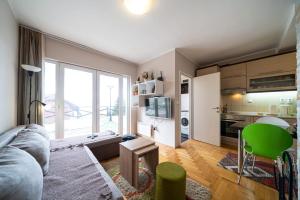 Η κουζίνα ή μικρή κουζίνα στο Zoara apartment