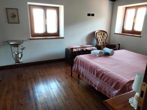 Кровать или кровати в номере La Sala Vecchia - Lovely Tuscan Holiday house Badia Prataglia, Casentino Valley