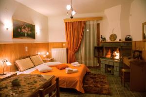 A seating area at La Petri Studios with Fireplace & View