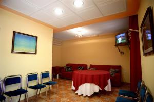 TV a/nebo společenská místnost v ubytování Hotel La Moraleda - Complejo Las Delicias