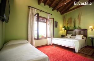 Ένα ή περισσότερα κρεβάτια σε δωμάτιο στο Hotel Casa Rural San Antón