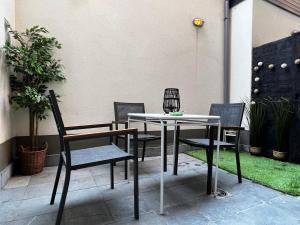 Patio nebo venkovní prostory v ubytování Modern cozy studio with backyard