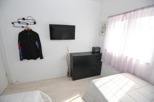 TV a/nebo společenská místnost v ubytování Split Old Town Apartment