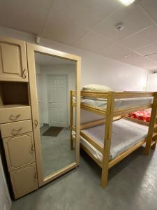 Двох'ярусне ліжко або двоярусні ліжка в номері Skujas