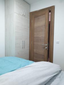 Katil atau katil-katil dalam bilik di Apartman Borovi Divčibare