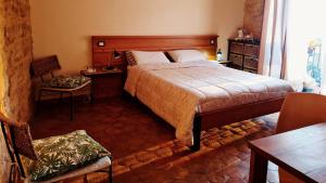 Postel nebo postele na pokoji v ubytování Aljama - Downtown B&B