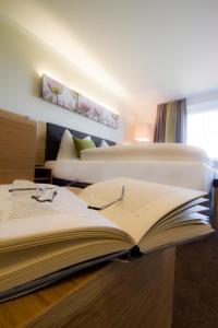 Ένα ή περισσότερα κρεβάτια σε δωμάτιο στο Hotel-Gasthof Beim Böckhiasl