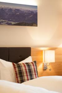 Ένα ή περισσότερα κρεβάτια σε δωμάτιο στο Hotel-Gasthof Beim Böckhiasl