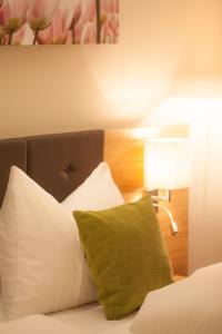 Ένα ή περισσότερα κρεβάτια σε δωμάτιο στο Hotel-Gasthof Beim Böckhiasl