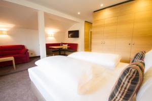 Ένα ή περισσότερα κρεβάτια σε δωμάτιο στο Hotel-Gasthof Beim Böckhiasl