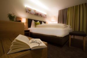 Ένα ή περισσότερα κρεβάτια σε δωμάτιο στο Hotel-Gasthof Beim Böckhiasl