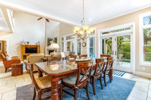 a dining room with a table and chairs at Bufflehead 3 in Kiawah Island +37 photos