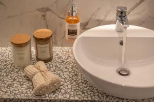 Koupelna v ubytování Romagna Suite Hotel