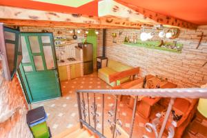 an overhead view of a room with a counter and a kitchen at House Luce in Neviđane +31 photos