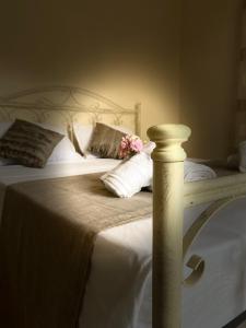 A bed or beds in a room at Casa Mary