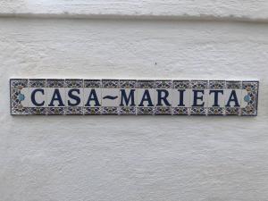 a sign on the side of a building at Casa Marieta A - Ideal per a families in Deltebre